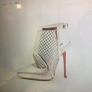 Silver heel sling back shoe